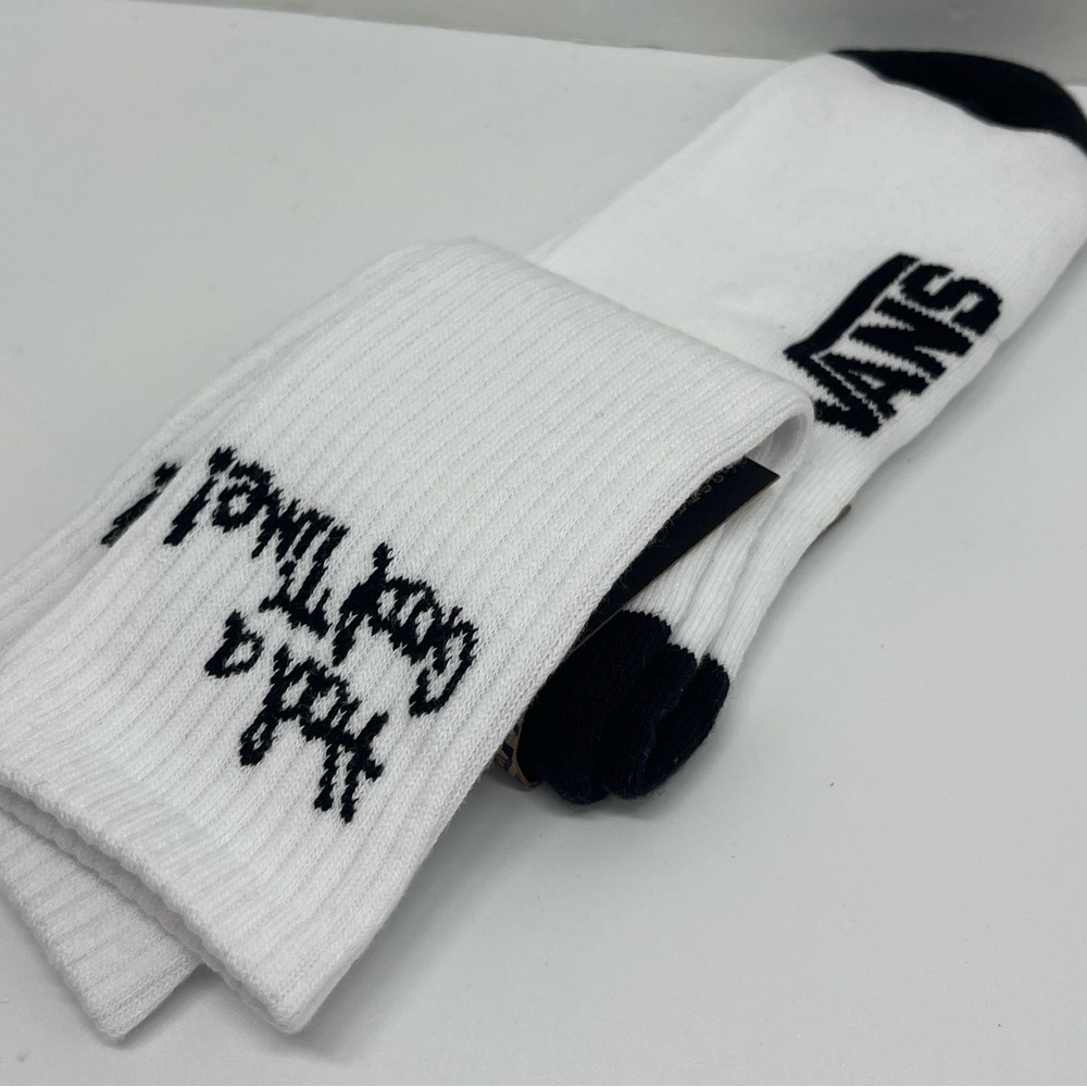 VANS "Off The Wall" Crew socks 
New with the tag authentic Vans socks (1 pair)